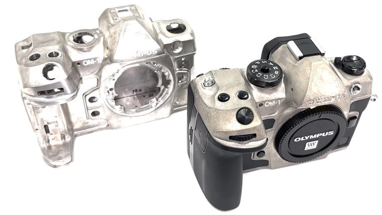 Камера OM-1 с неокрашенным и необработанным корпусом